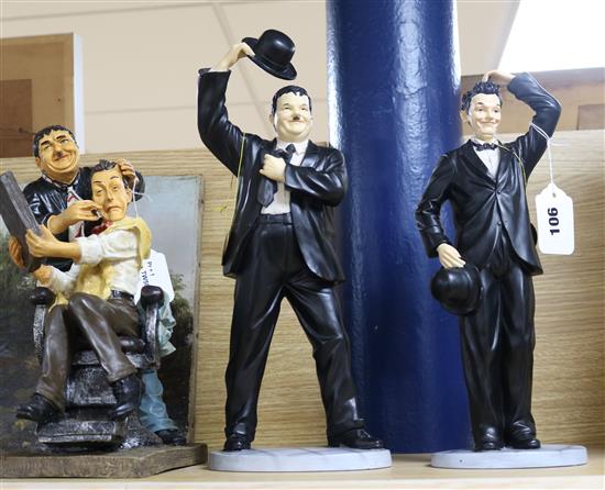A pair of Leonardo resin figures of Laurel and Hardy and a Laurel and Hardy barber shop group